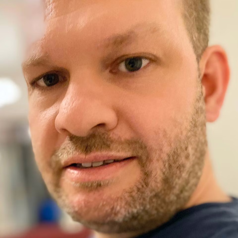 Michael Denyer looks to camera