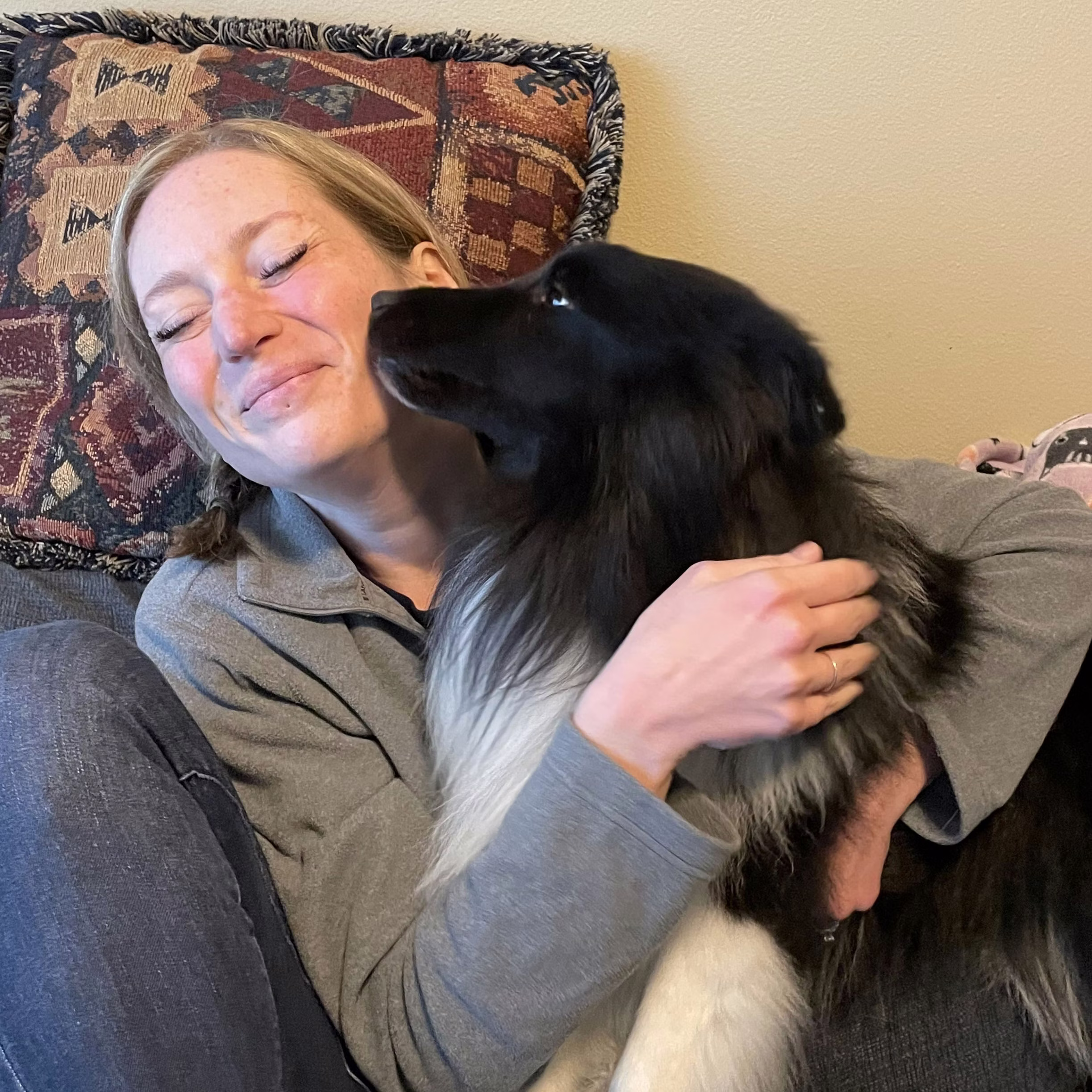 Jamie Freyer and her black and white dog
